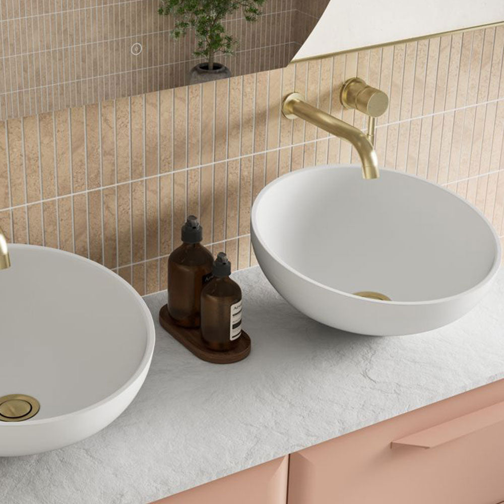 Countertop washbasins with brassware in a finished bathroom