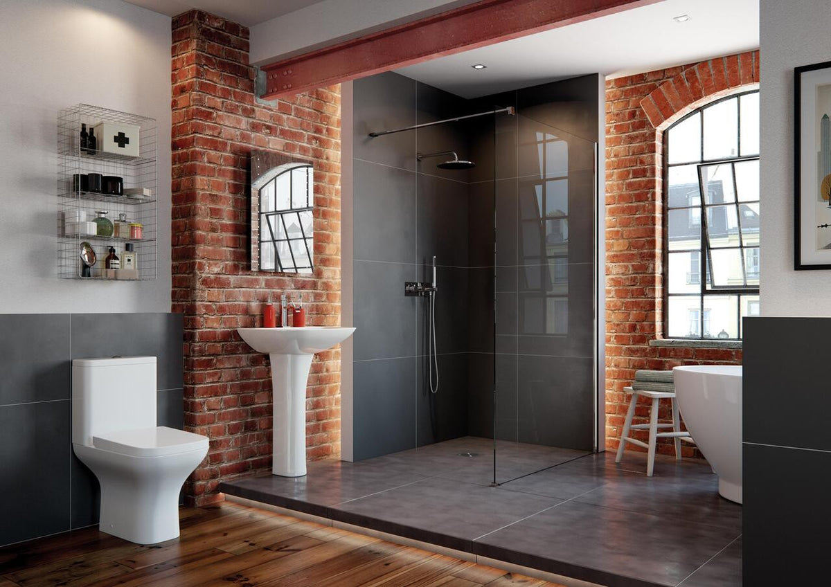 Auvellis Arven Rimless Back To Wall Toilet With Wrapover Soft Close Seat in a bathroom setting