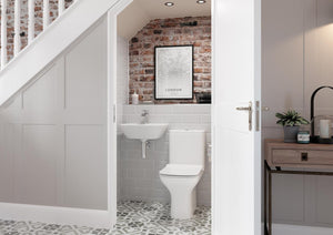 Auvellis Arven Rimless Back To Wall Toilet With Wrapover Soft Close Seat in a bathroom setting