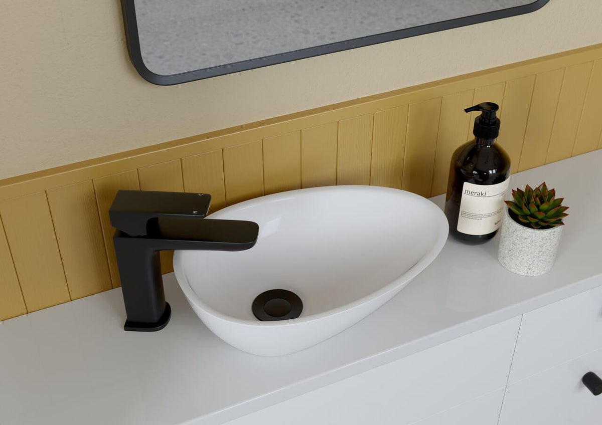 Auvellis Ava 320mm Mini Resin Countertop Washbasin – White in a bathroom setting