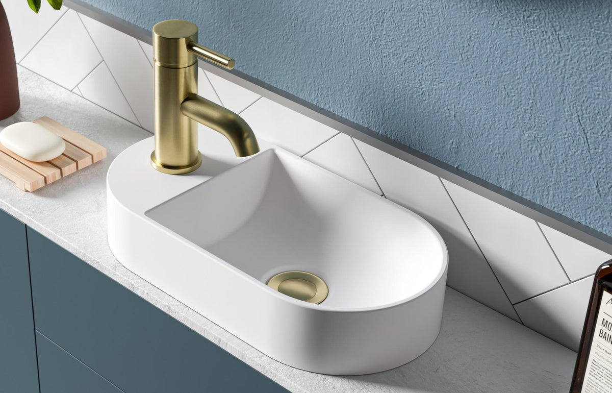 Auvellis Bella 380mm Mini Resin Countertop Washbasin – White in a bathroom setting