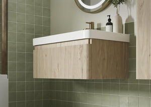 Auvellis Vela Curved Floor-Standing 2-Drawer Vanity Unit with Basin in a bathroom setting