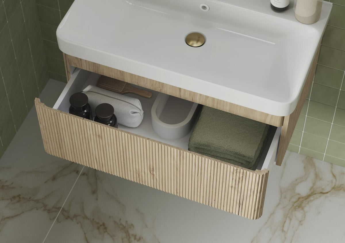 Auvellis Vela Curved Floor-Standing 2-Drawer Vanity Unit with Basin in a bathroom setting