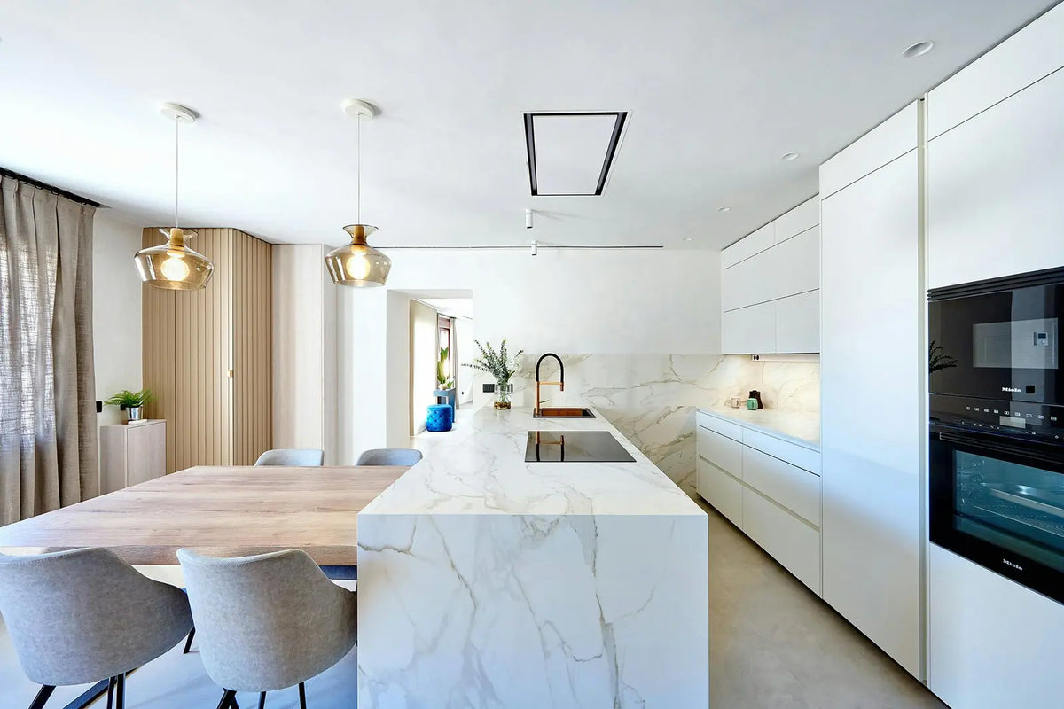 Cosentino — A veined island beside a dining space